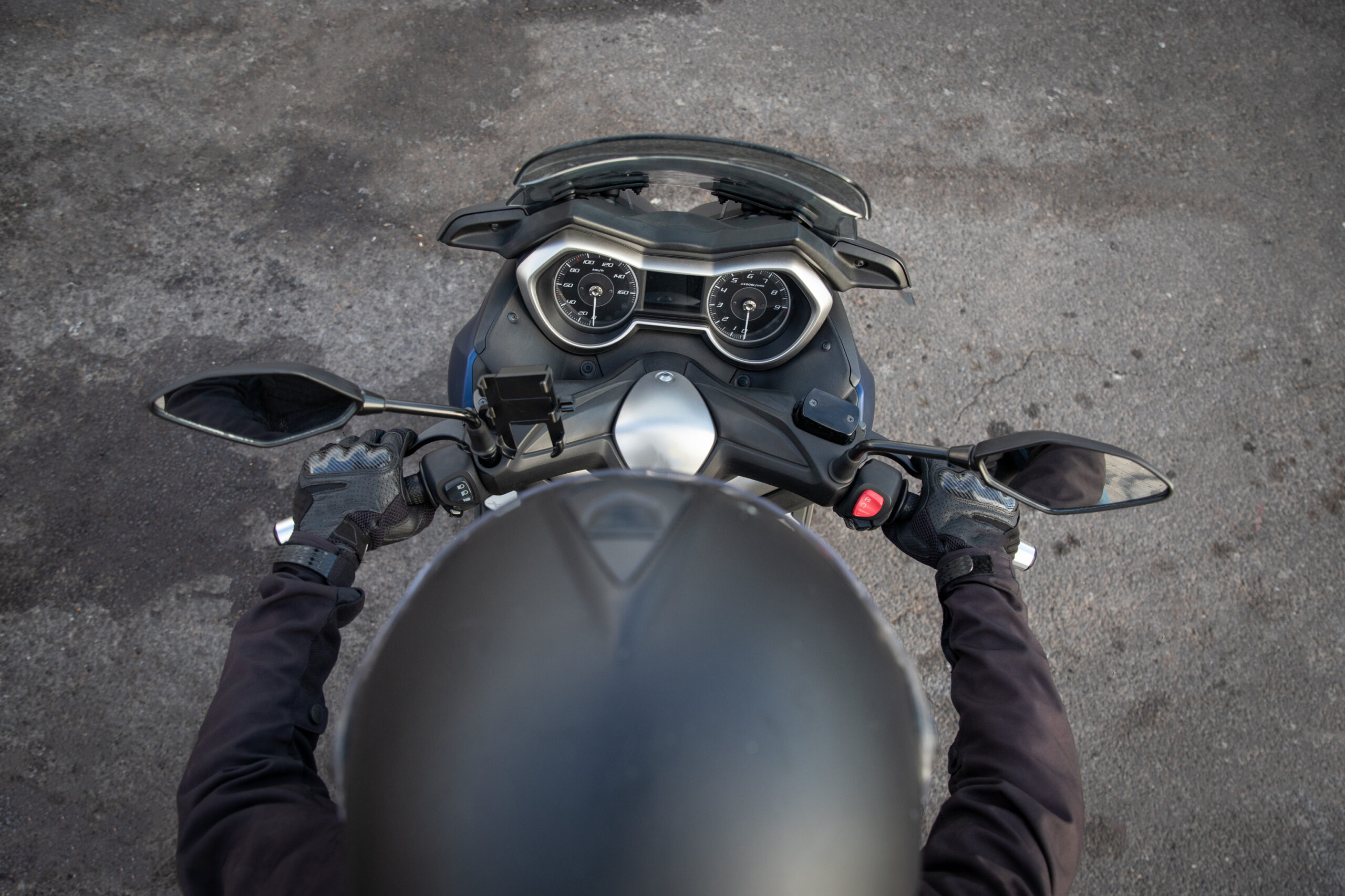 Top view of a biker riding his motorcycle, photo with copy space.
